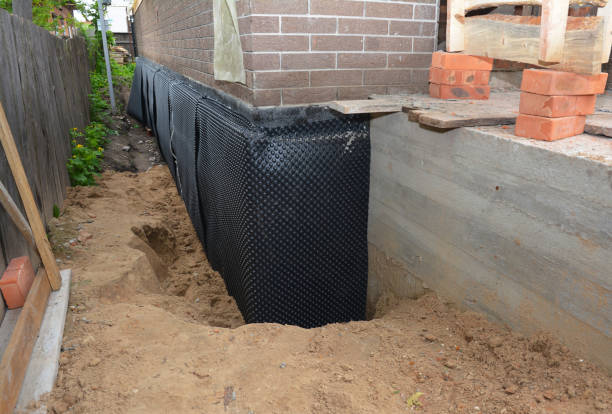 SJ Waterproofing Pros technician performing targeted Exterior Waterproofing assessment in Gibsonburg, OH